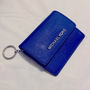 Blue Michael Kors women’s wallet.